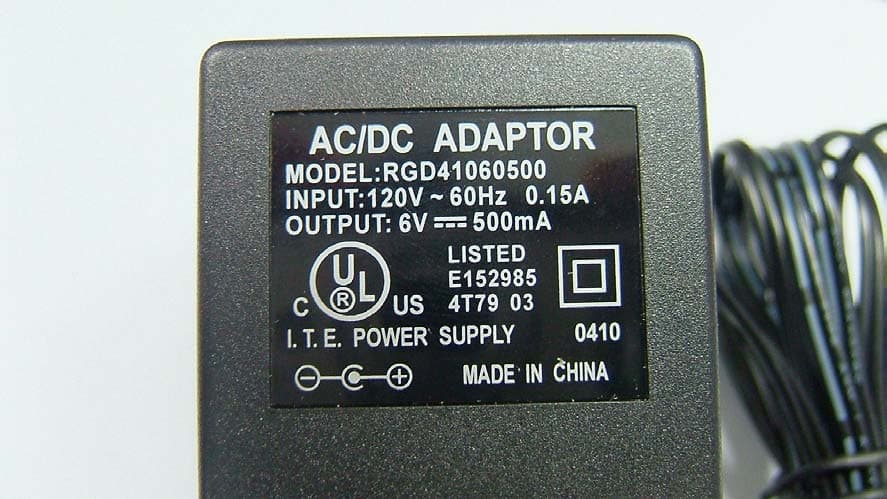 Charger Base with 900MHz Transmitter - FCC ID NPQRFM1000 - Telian Corporation
