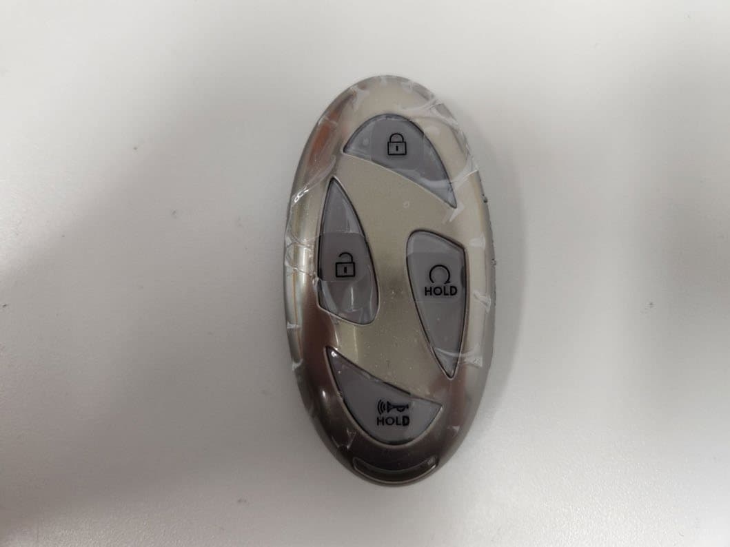 Remote Keyless Entry Transmitter - FCC ID NYOMBEC7FOB2208 - MOBASE ELECTRONICS CO., LTD.