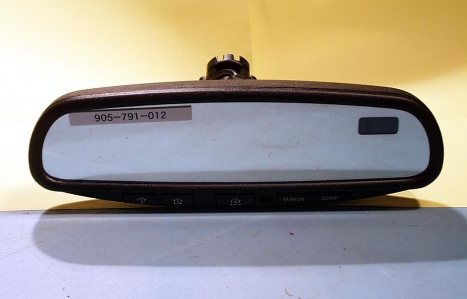 Universal Garage Door Opener in Mirror - FCC ID NZLACHL3 - Gentex Corporation
