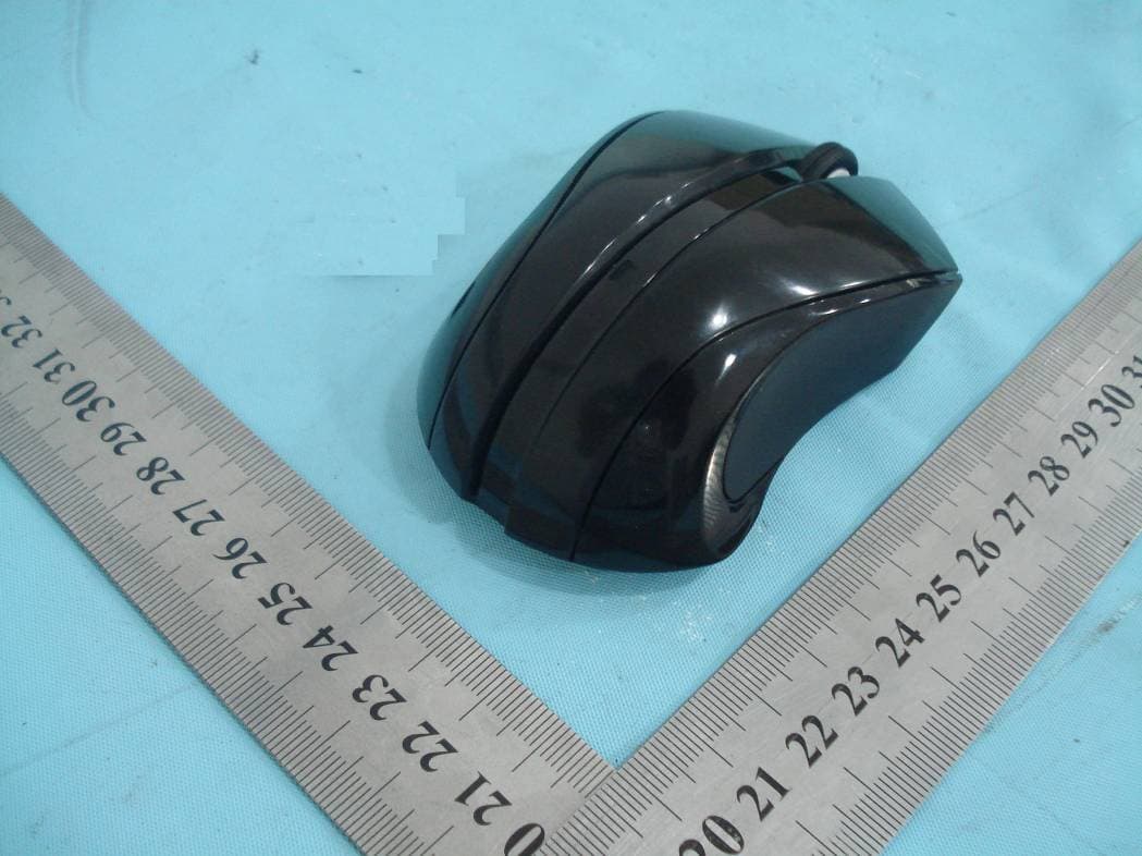 2.4G Wireless Optical Mouse - FCC ID O5EG9330 - Design Trends, Inc.