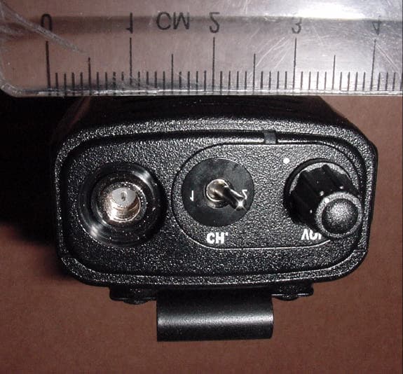 TNF - Licensed Non-Broadcast Transmitter Held to Face - FCC ID O7KPL450A - Midland Radio Corporation