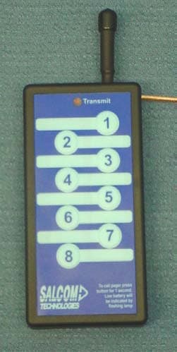 UHF Pocket Paging Transmitter - FCC ID O871185 - Sea Air and Land Communications