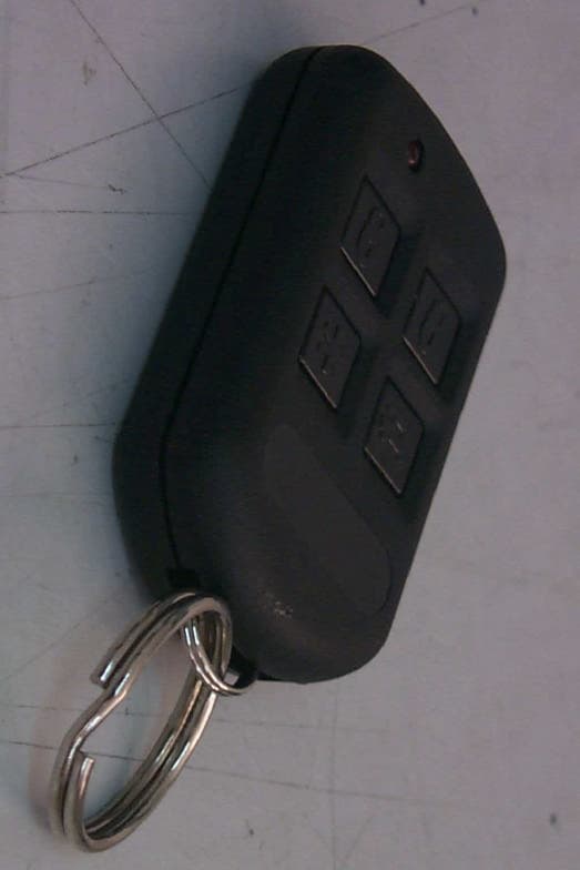 REMOTE CONTROL SECURITY TRANSMITTER - FCC ID OARTXAM2000 - Precision Engineering Ind Inc (2)