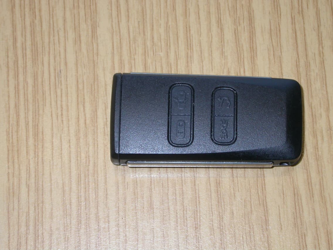 RKE Key Fob - FCC ID OHT7003186 - Strattec Security Corporation (2)