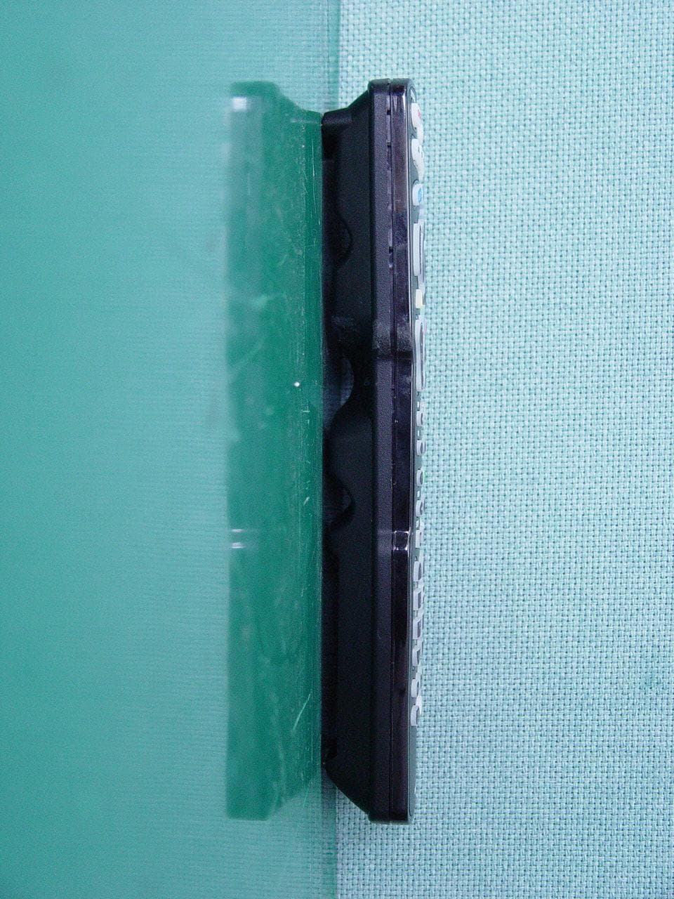 RF Remote Controller - FCC ID OZ5URC9000LRF - Ohsung Electronics Co., Ltd. (2)