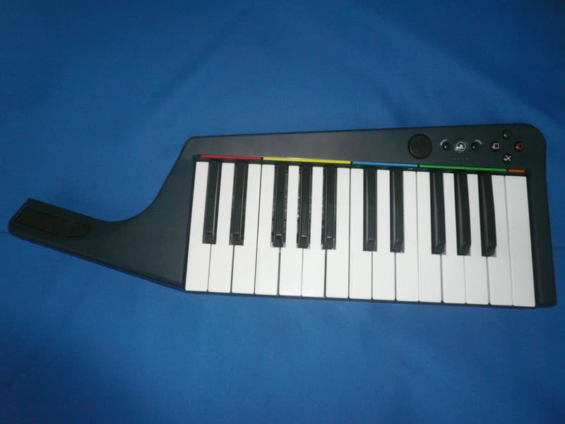 Rock Band Wireless Pro Keyboard for PlayStation 3 - FCC ID P25M797161Y2310C - Mad Catz, Inc. (1)