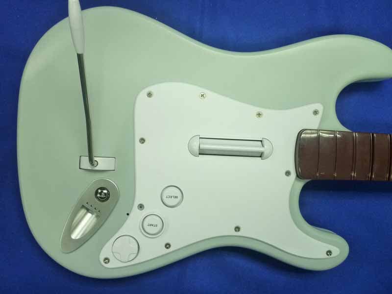 Rock Band Wireless Fender Stratocaster Guitar Controller for PlayStation 3 - FCC ID P25SU97561Y2510C - Mad Catz, Inc. (1)
