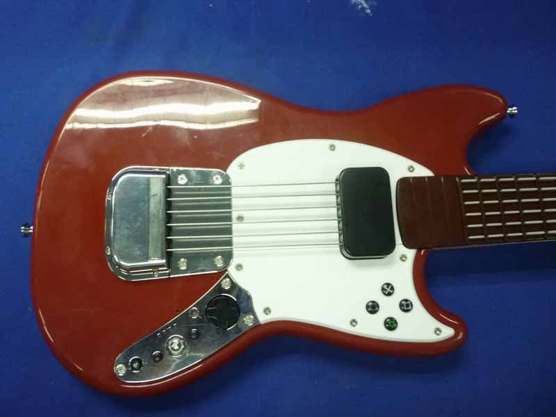 Rock Band Wireless Fender Stratocaster Guitar Controller for PlayStation 3 - FCC ID P25SU97563Y3010C - Mad Catz, Inc. (1)