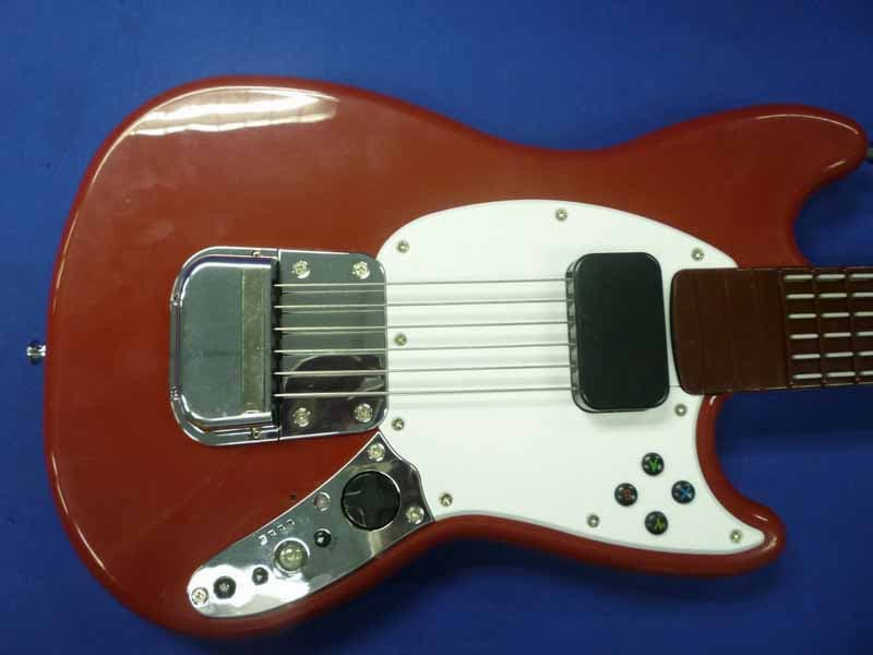 Rock Band 3 Wireless Fender Mustang ProGuitar Controller for Xbox 360 - FCC ID P25SU98563Y3010C - Mad Catz, Inc. (1)