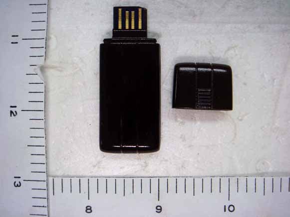 802.11n USB Wirless Adapter - FCC ID P27UB811RN - Sercomm Corporation (1)