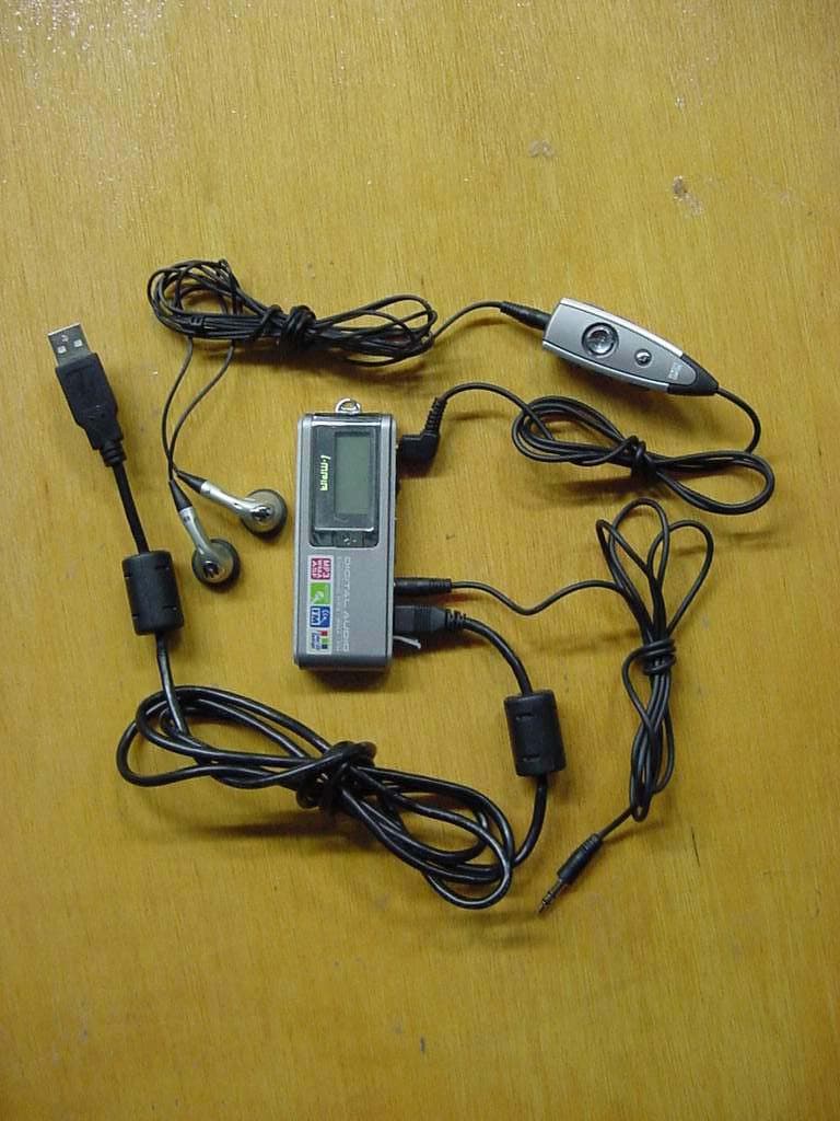MP3 Player - FCC ID P42IMP4000 - Decktron Co., Ltd.