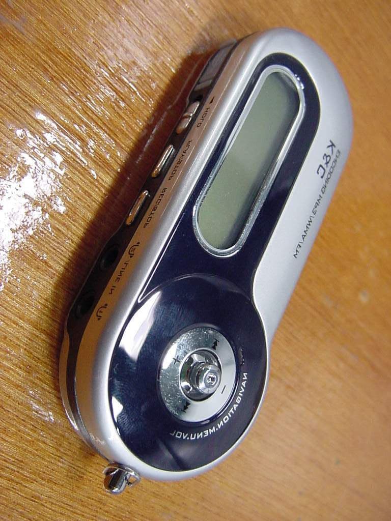 MP3 PLAYER - FCC ID P42IMP5000 - Decktron Co., Ltd.