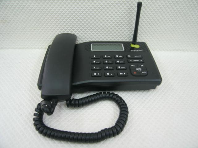 WLL Telephone DUAL-BAND GSM - FCC ID PH7PG110 - Axesstel Inc