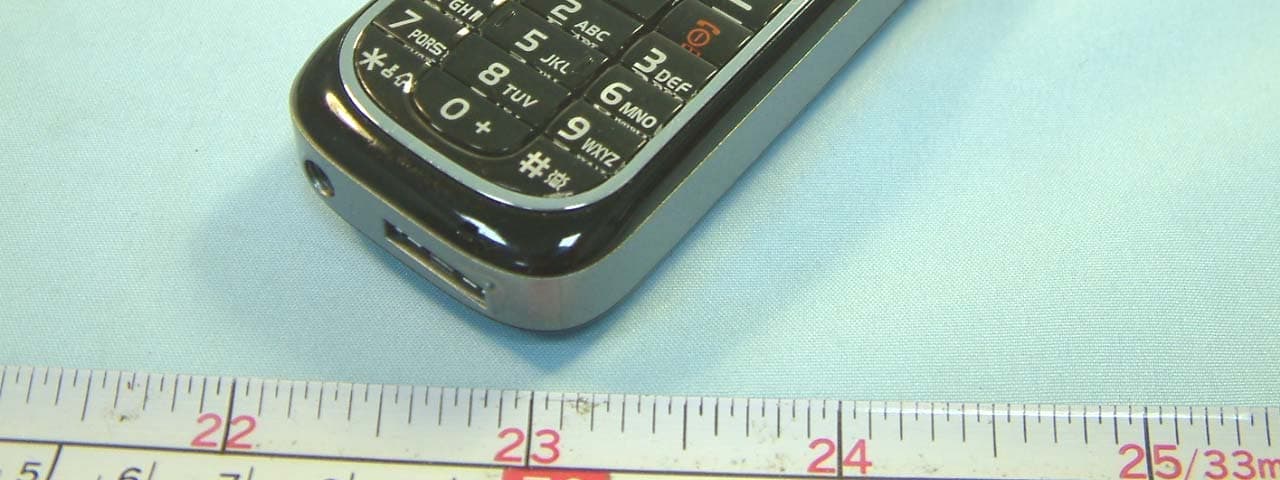 Tri Band GSM Mobile Phone - FCC ID PJO-KMP6J1CB - Arima Communication Corporation