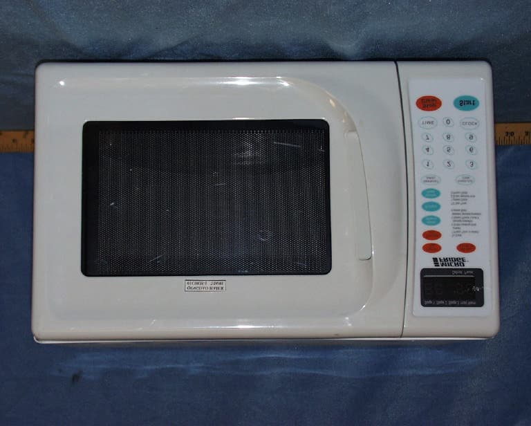 700W OUTPUT MICROWAVE OVENS - FCC ID PKAHR6701M02T - Qingdao Haier Microwave Production Co., Ltd.