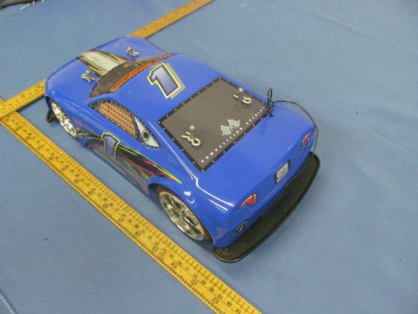 Radio Control Vehicle 1/14 Express Lane RC - FCC ID PKG81200RC49 - May Cheong Toy Products Fty. Ltd. (3)