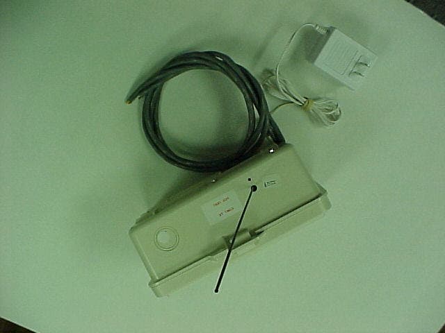 Access System Transmitter - FCC ID PM7-DCMI2001 - Recognition Source, LLC