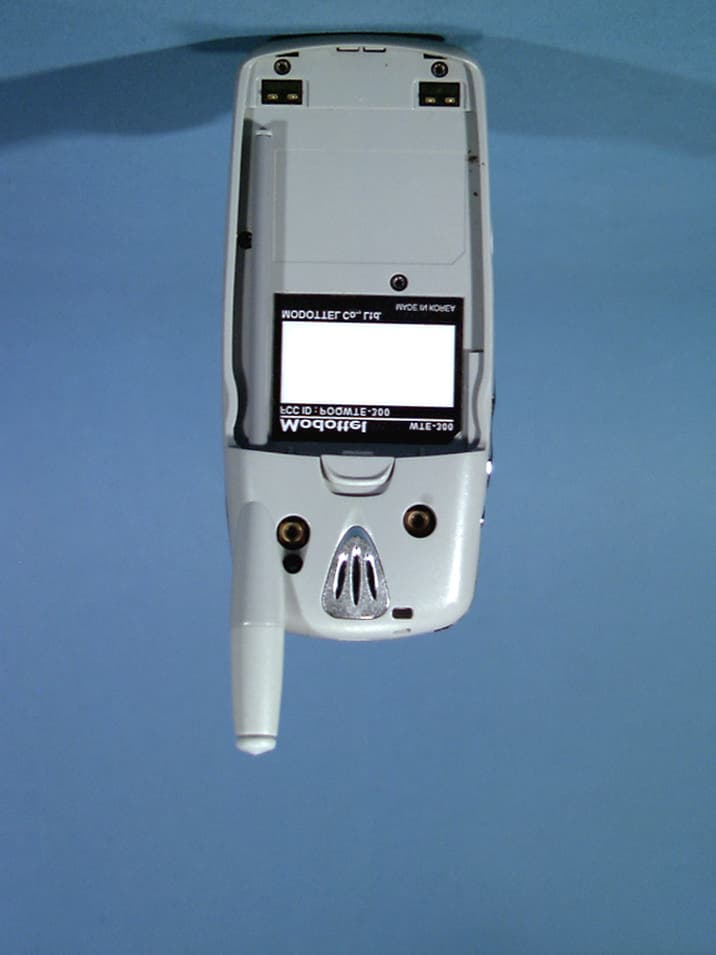 Tri-Mode Dual-Band Analog/PCS CDMA Phone - FCC ID POQWTE-300 - Modottel Co Ltd (5)