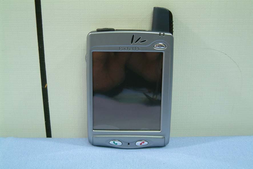 Tri-Band (850/1800/1900) GSM/GPRS Packet PC Phone - FCC ID PU5SP230A - Wistron Corporation