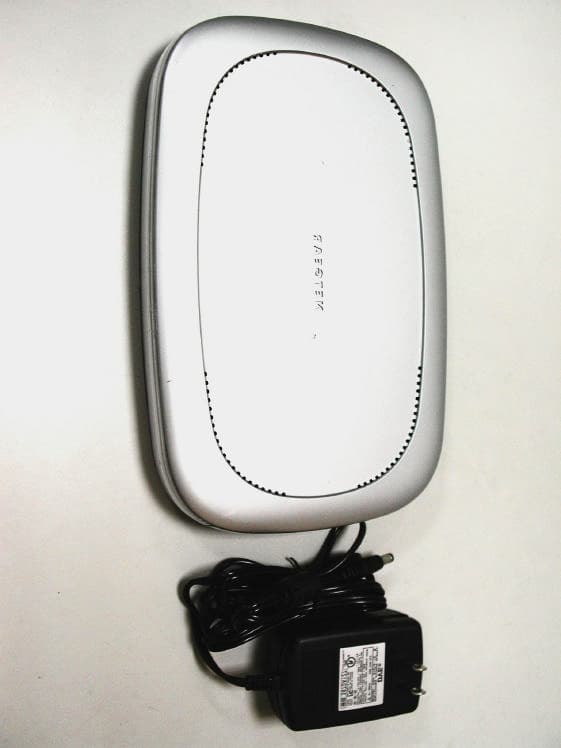 Wireless Cable Modem/Router - FCC ID PY3CG814W - Netgear Incorporated (4)