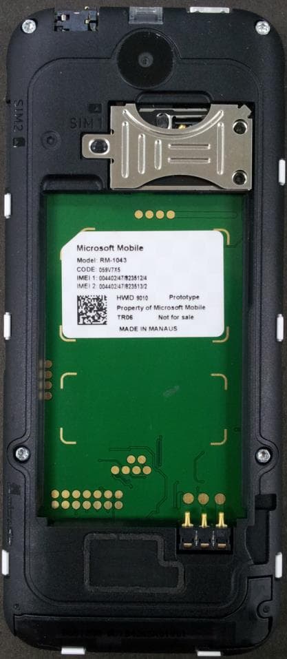 GSM cellular phone w/BT - FCC ID PYARM-1043 - Microsoft Corporation