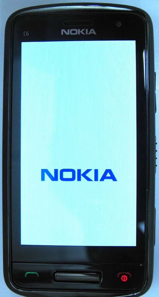 GSM/WCDMA cellular telephone phone with Bluetooth and WLAN - FCC ID PYARM-718 - Microsoft Corporation