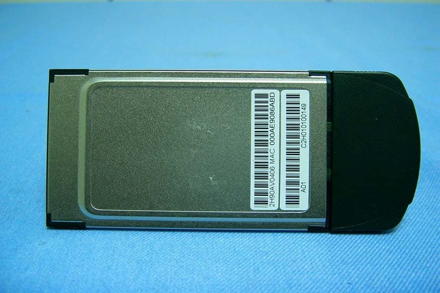 802.11b WLAN PCMCIA Card W/Detachable Antenna - FCC ID QDWWN113SH18 - AirVast Technology Inc.