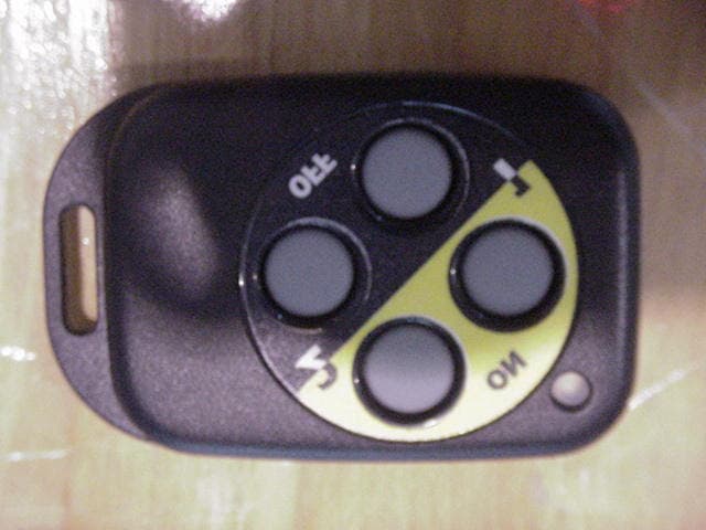 Wireless key chain remote control - FCC ID QGHHCCKR - Leviton Manufacturing Co., Inc.