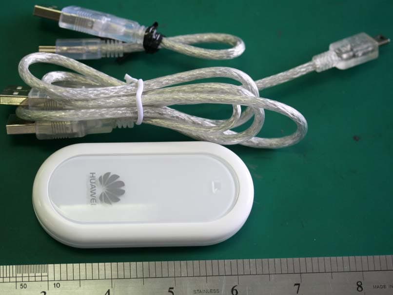 HSDPA USB Modem - FCC ID QISE220 - Huawei Technologies Co.,Ltd