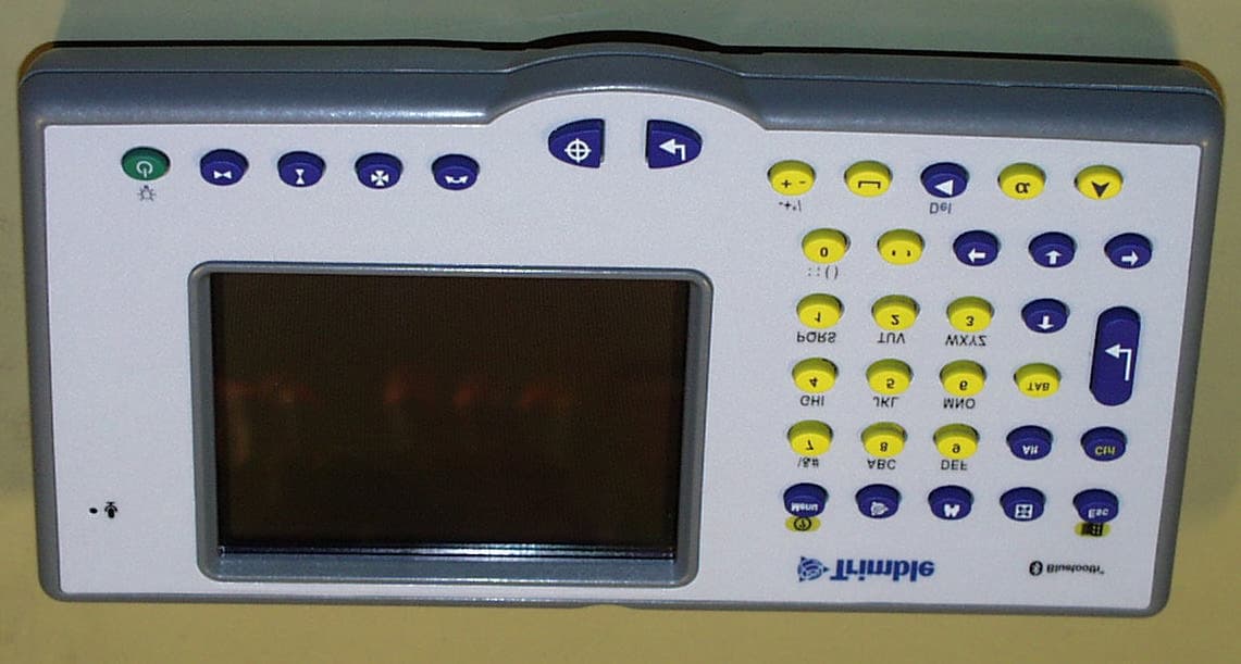 Attachable Control Unit for Surveying Instruments - FCC ID QKV571225500 - Trimble AB