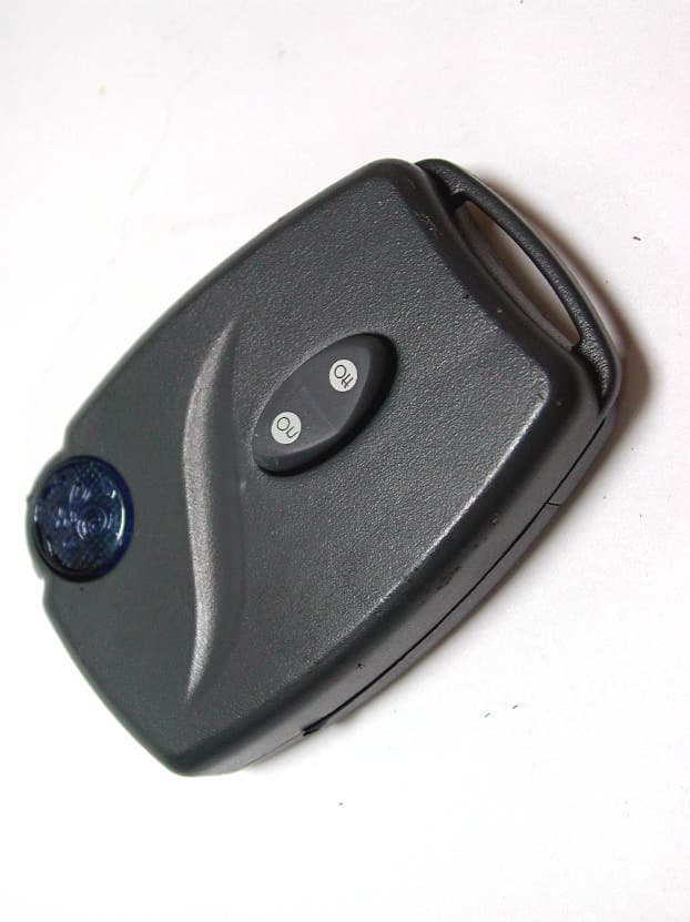 Hand-Holding Transmitter - FCC ID QOB-PT458 - Jasco Products Company LLC
