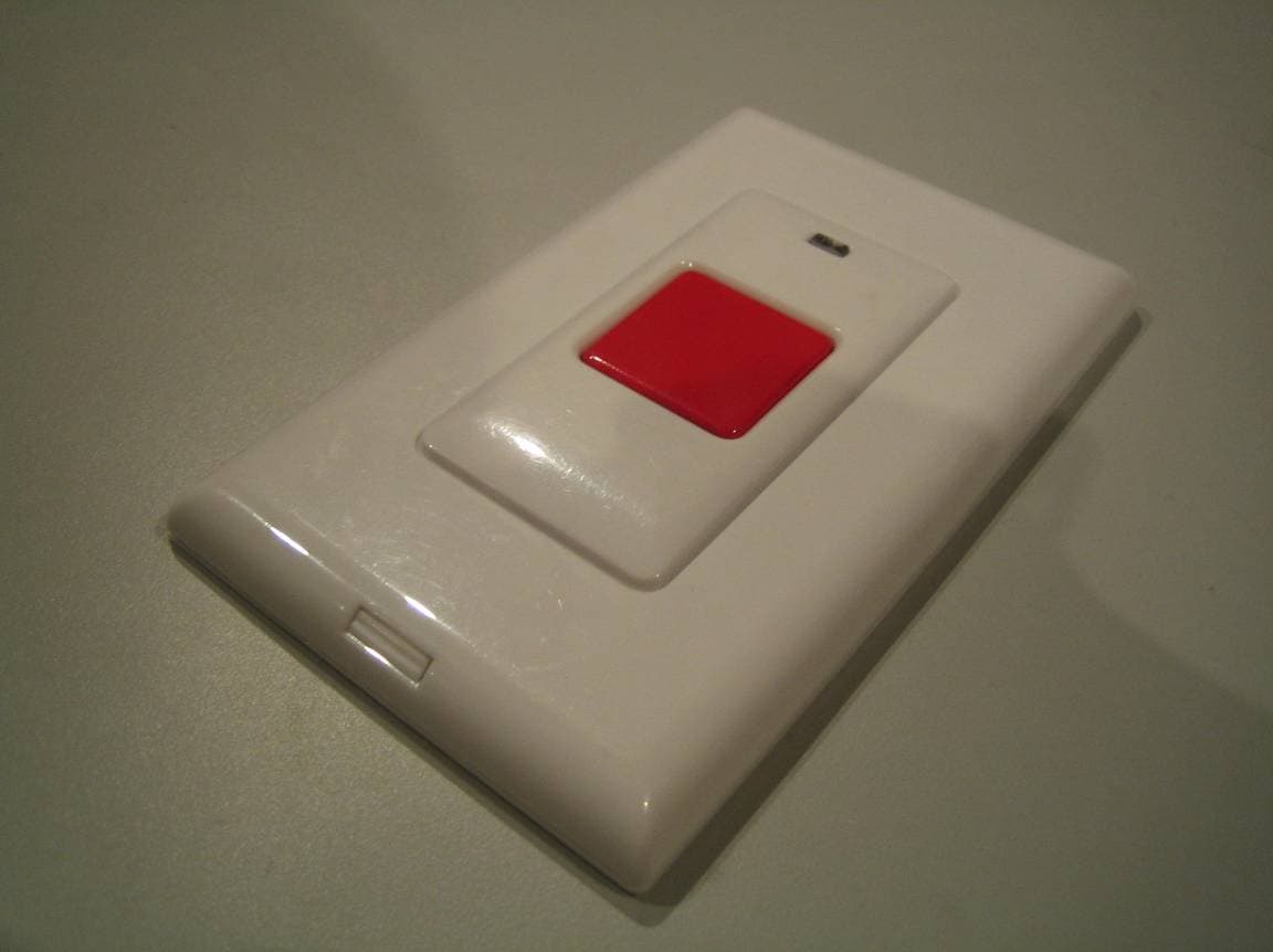 Remote button - FCC ID QOB45145 - Jasco Products Company LLC (2)