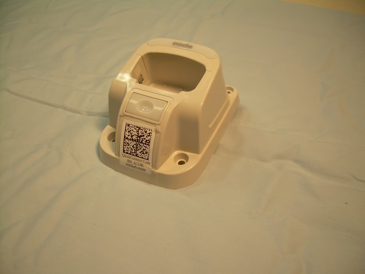 CHARGER WITH BLUETOOTH TRANSCEIVER - FCC ID QQ6-BTC02 - Code Corporation