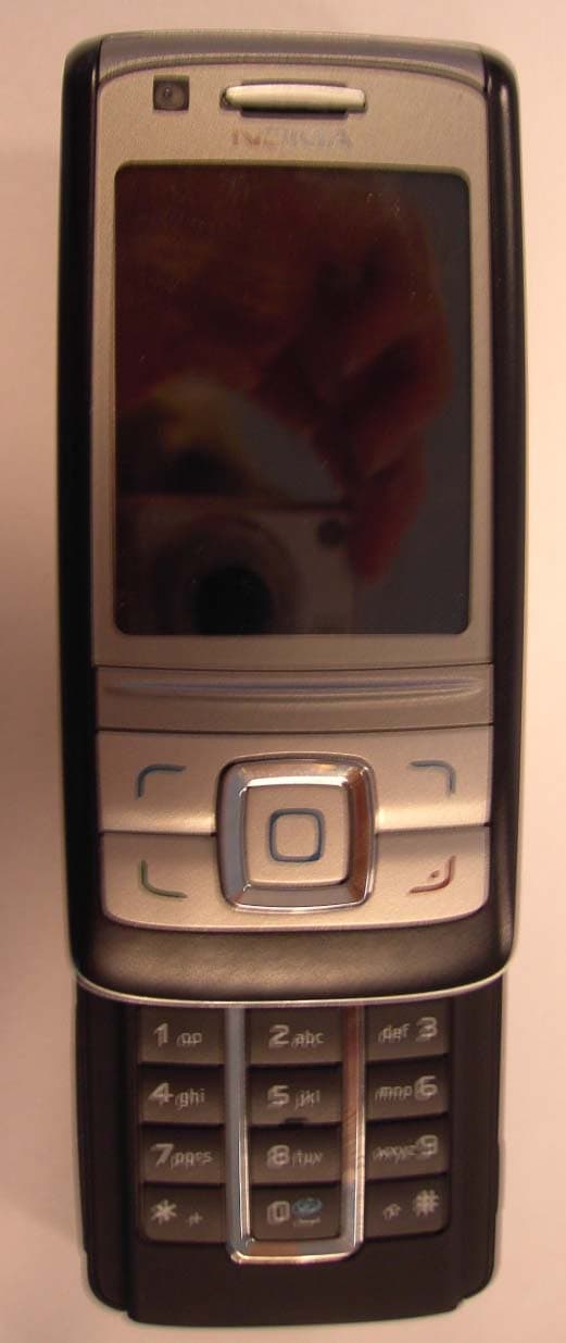 GSM900/1800/1900/FDD I Cell Phone w/BT - FCC ID QTKRM-78 - Microsoft Corporation