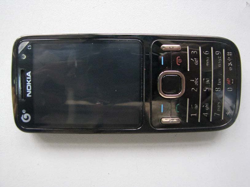 GSM 900/1800/1900 Cellular Telephone with BT - FCC ID QTLRM-677 - Microsoft Corporation