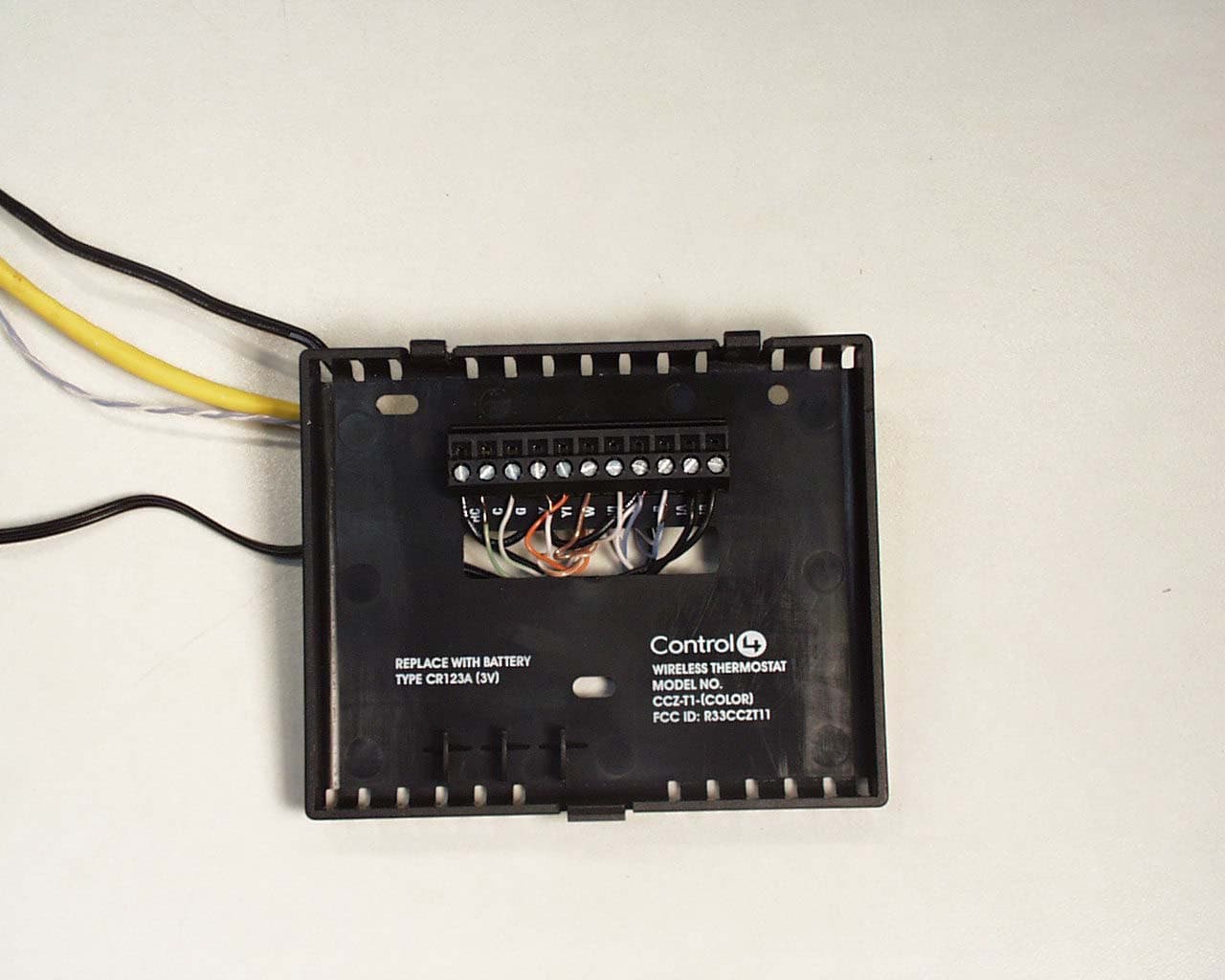 Wireless Thermostat Model CCZ-T1-X - FCC ID R33CCZT11 - Snap One, LLC