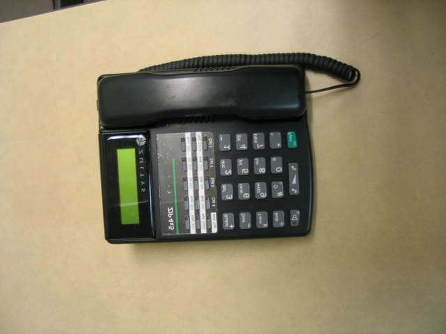 Bluetooth FHSS transceiver in VOIP Phone - FCC ID R7NZIP4X5 - Zultys Technologies