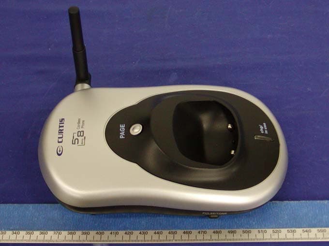 900 MHz Analog Cordless Phone - Base - FCC ID R9WTC-STC590-595 - Qiaoxing Telecom Industry Co., Ltd. (4)