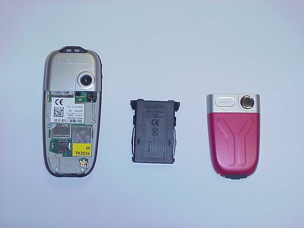 GSM 900/1800/1900 Mobile Phone - FCC ID RAD007 - TCT Mobile Limited