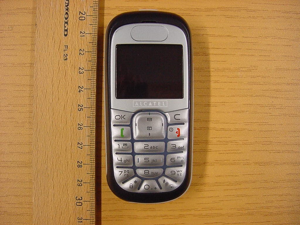 GSM 850 /1900 Mobile Phone - FCC ID RAD010 - TCT Mobile Limited