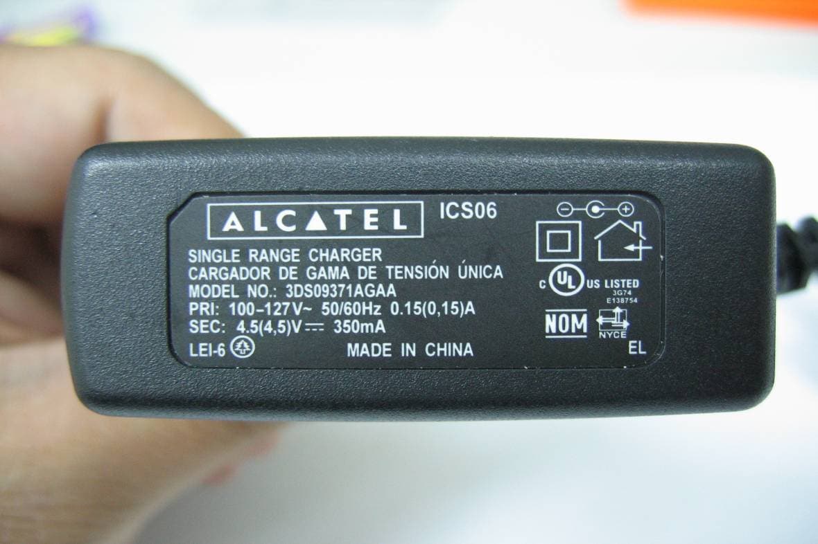 GSM 850/1900MHz MOBILE PHONE - FCC ID RAD058 - TCT Mobile Limited
