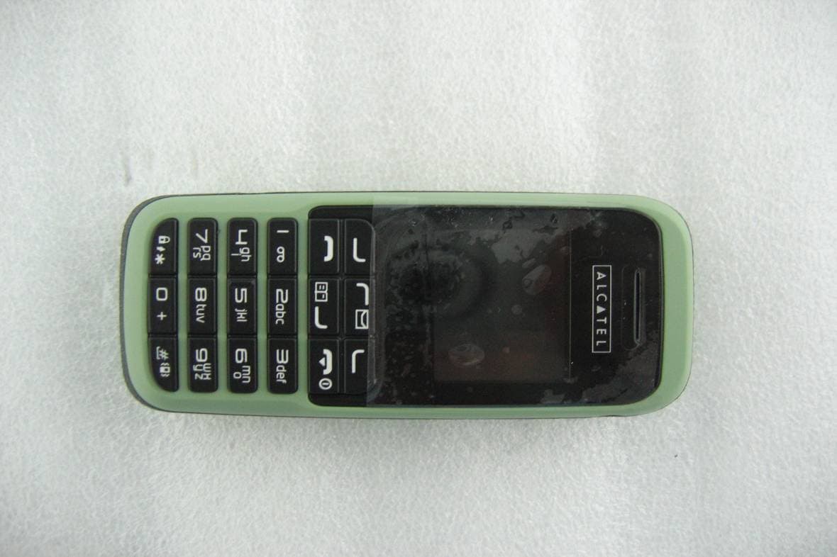 GSM 850/1900MHz MOBILE PHONE - FCC ID RAD059 - TCT Mobile Limited (5)