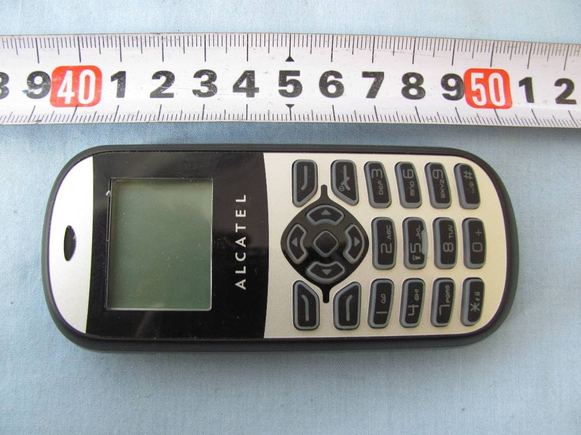 GSM850/PCS1900 dualband mobile phone - FCC ID RAD144 - TCT Mobile Limited (4)
