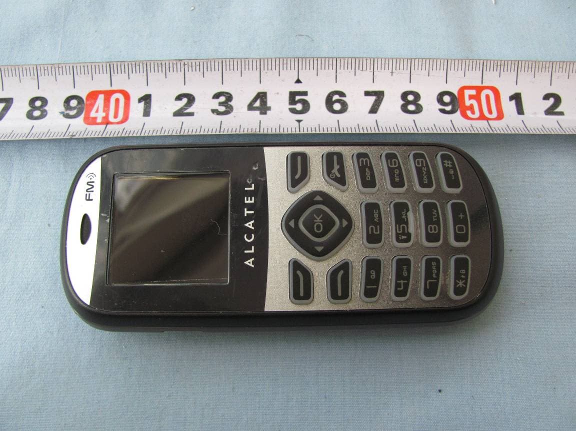 GSM850/PCS1900 dualband mobile phone - FCC ID RAD145 - TCT Mobile Limited (4)