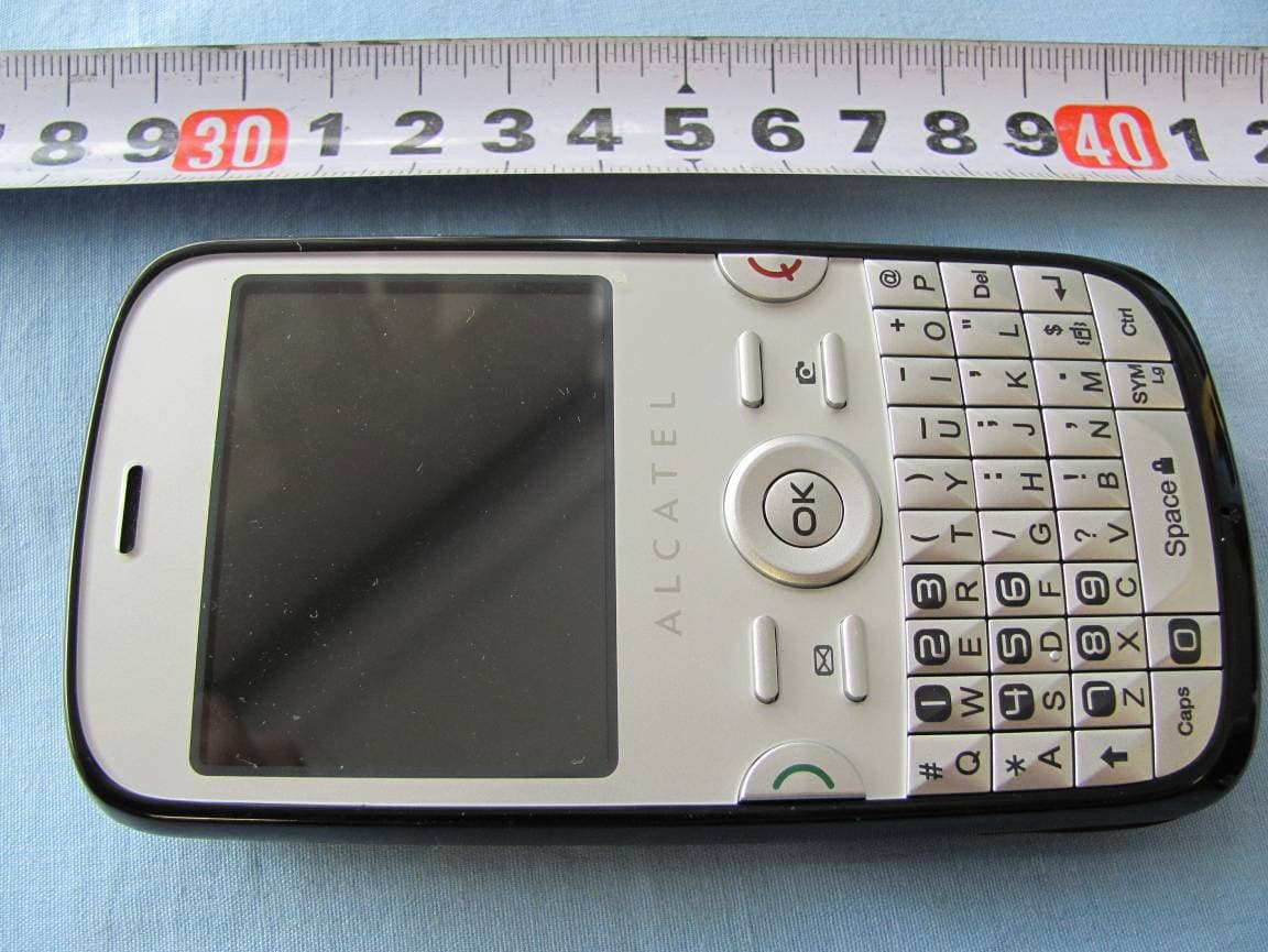 GSM/GPRS/EDGE dual band mobile phone - FCC ID RAD152 - TCT Mobile Limited (4)