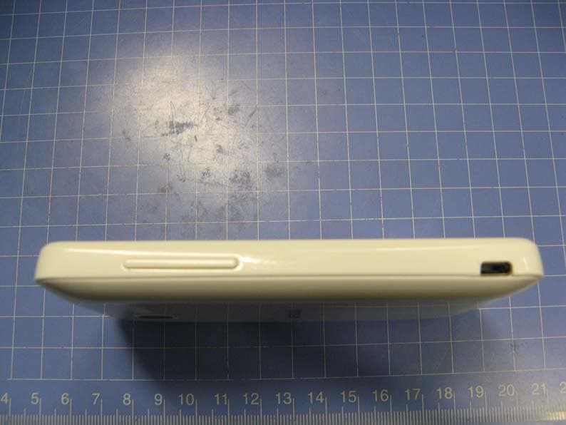 GSM quad bands mobile phone - FCC ID RAD320 - TCT Mobile Limited
