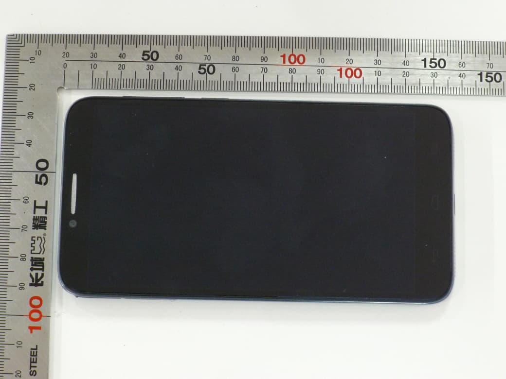 GSM/GPRS/EDGE/UMTS Digital Mobile Phone with Bluetooth and WiFi - FCC ID RAD458 - TCT Mobile Limited (2)