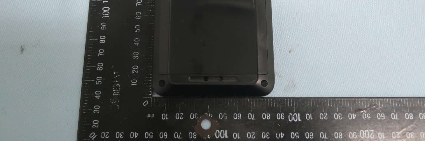 Handheld wireless data terminal - FCC ID RBWEMC0550 - Elo Touch Solutions, Inc. (3)