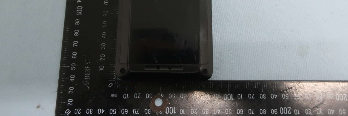 Handheld wireless data terminal - FCC ID RBWEMC0550C - Elo Touch Solutions, Inc. (5)