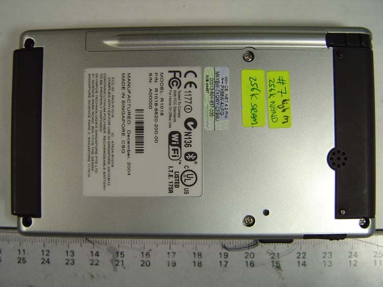 Handheld WinCE Device w/ Bluetooth & 802.11b WLAN - FCC ID RKS-R1018 - Olympus Technologies Singapore Pte Ltd